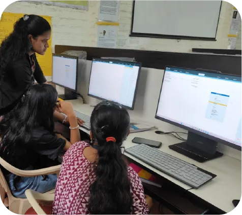 Trainer explaining accounting concepts to students in a classroom session